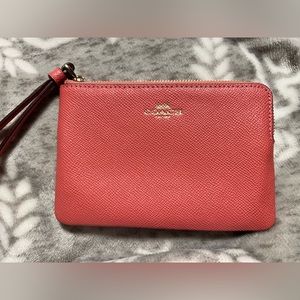 Pink coach wristlet